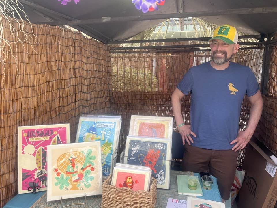 Benjamin W Burch displaying artwork at Tiki Caliente